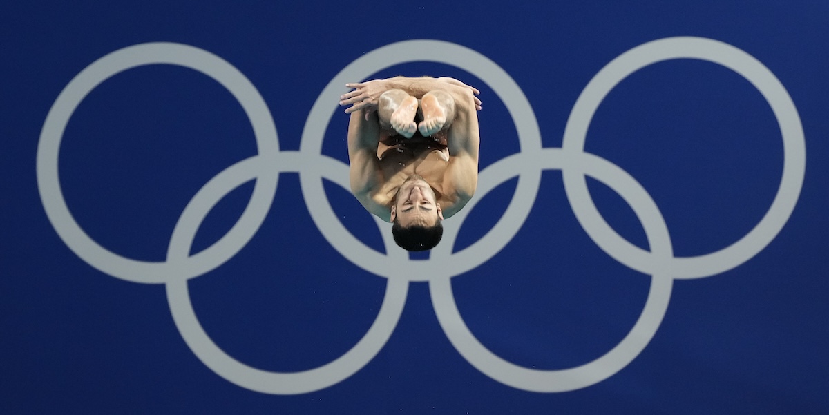 L'italiano Giovanni Tocci gareggia nel trampolino da tre metri, dove è stato eliminato 
(AP Photo/Lee Jin-man)