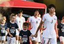 L'ingresso in campo della nazionale femminile della Corea del Nord per l'amichevole contro la Russia, giocata a Mosca il 15 luglio