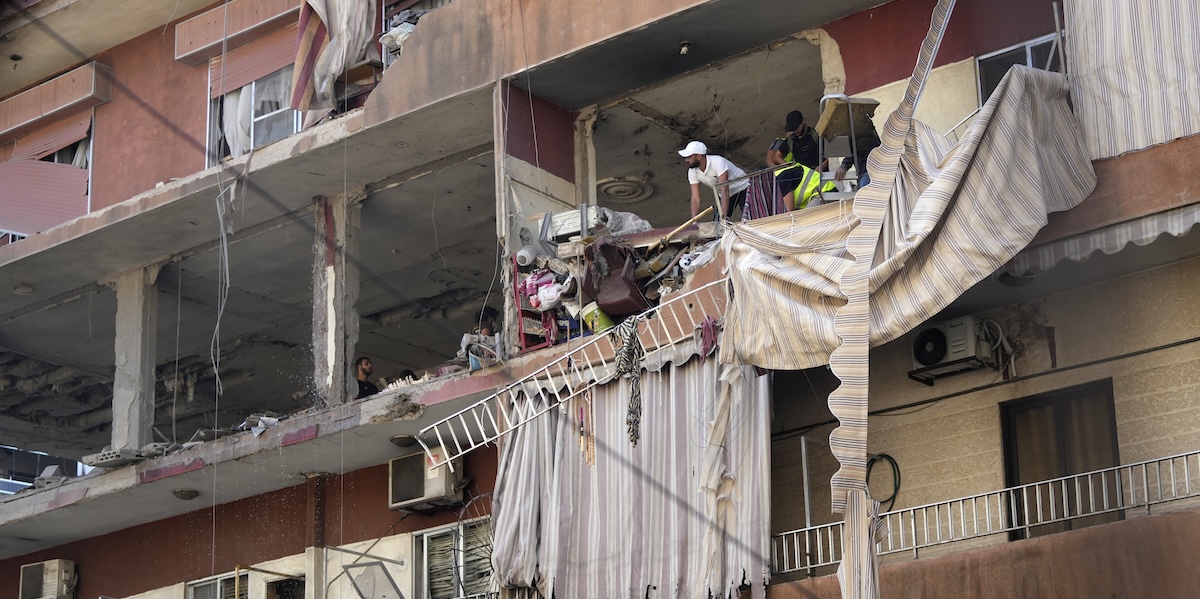 Un edificio distrutto durante l'attacco israeliano sulla città di Beirut, 24 settembre 2024 (AP Photo/Hassan Ammar)