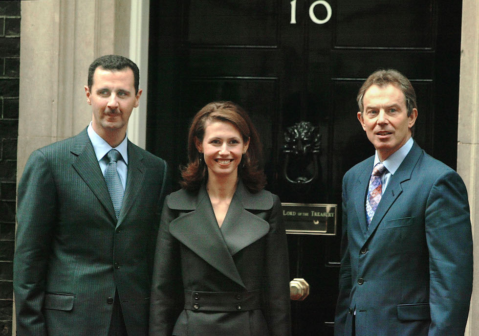 Bashar e Asma al Assad con l'alloraprimo ministro britannico Tony Bleir nel 2002 