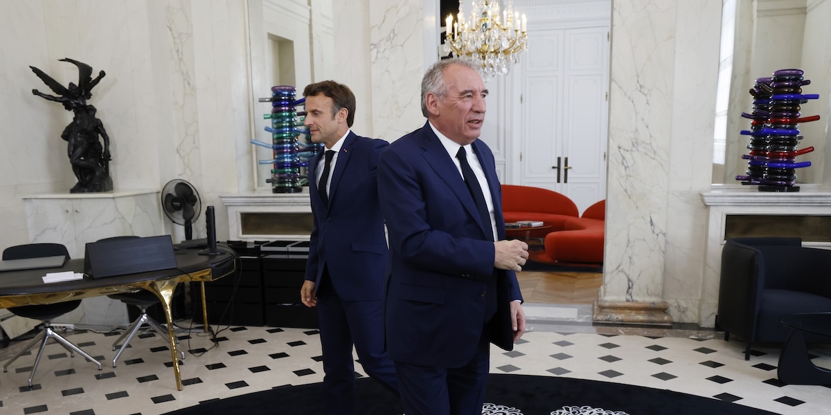 Emmanuel Macron e François Bayrou (Ludovic Marin/Pool photo via AP)